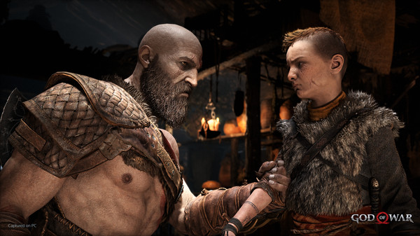Game capture image from the game God of War on PC showing Kratos holding his son by the arm