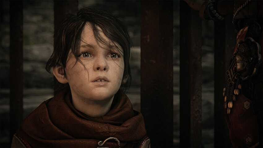 Close up image from A Plague Tale: Requiem of the young boy's face