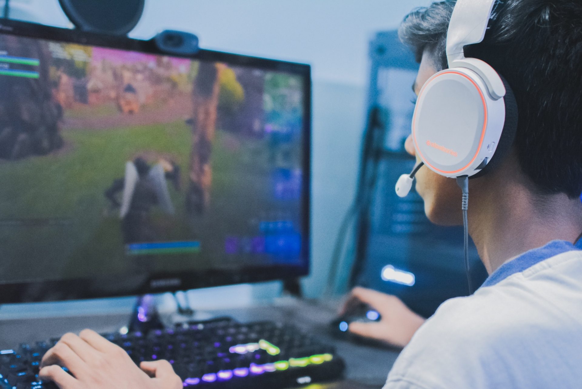 Image of a boy playing Fortnite on a PC