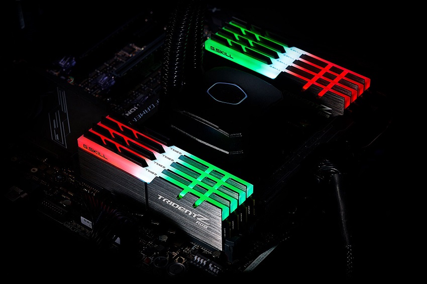 Image showing 8 sticks of G-Skill Trident RAM with red, green and white RGB