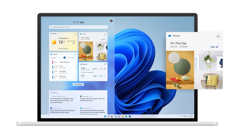 Promotional Microsoft Windows 11 image that shows the widget menu on a laptop