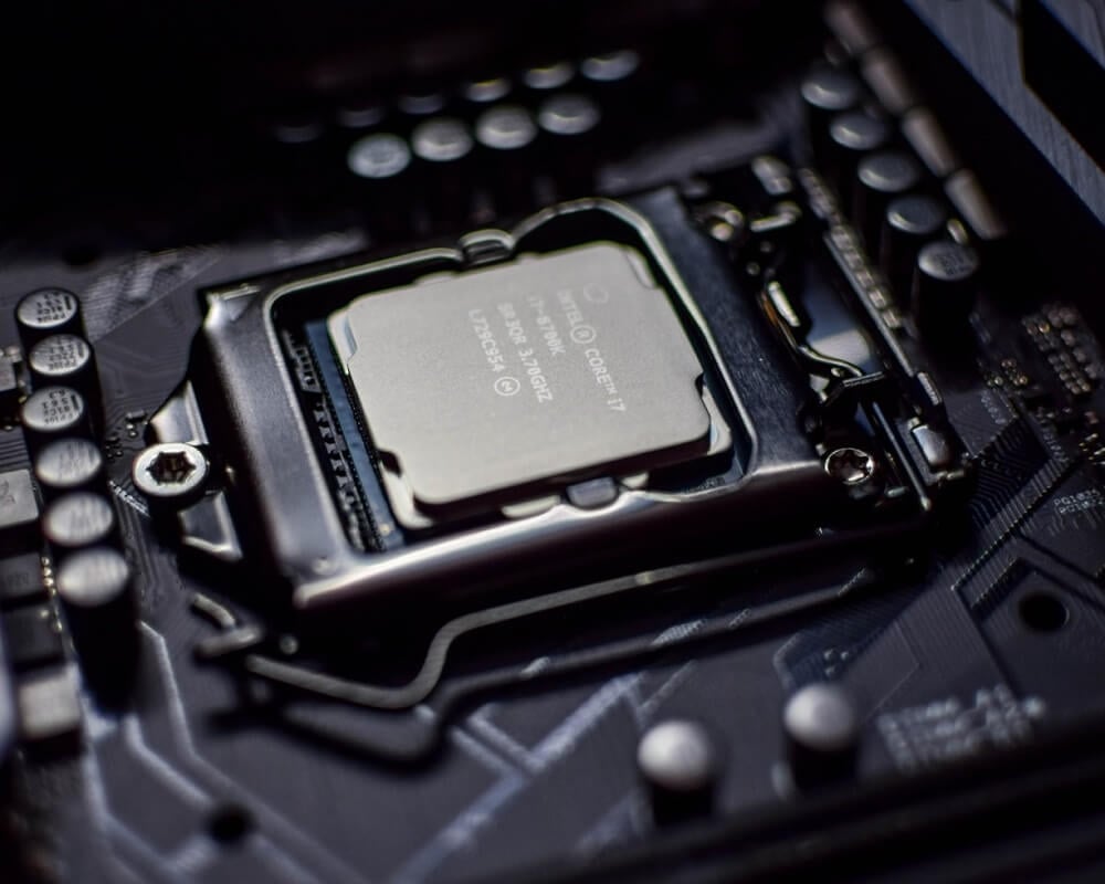 Image of an Intel Core i7 CPU in its socket on a motherboard